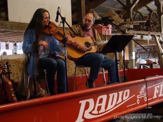 Playing in a giant red flyer wagon